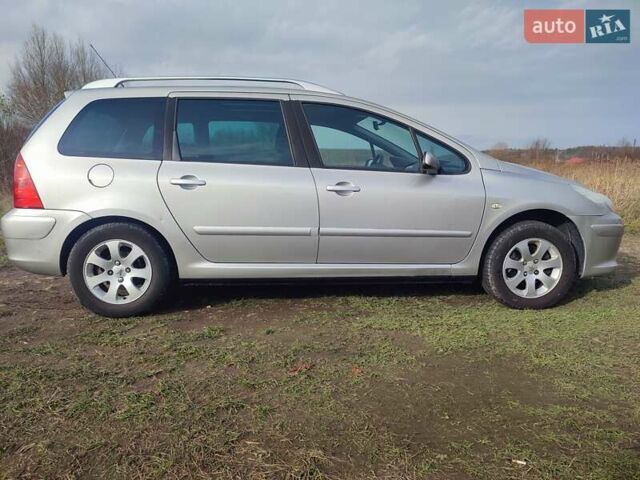 Серый Пежо 307, объемом двигателя 1.6 л и пробегом 223 тыс. км за 4950 $, фото 6 на Automoto.ua