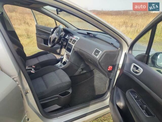Серый Пежо 307, объемом двигателя 1.6 л и пробегом 223 тыс. км за 4950 $, фото 12 на Automoto.ua