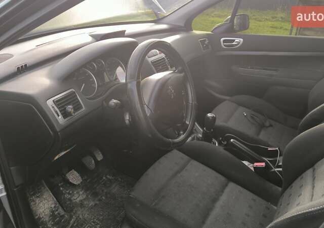 Сірий Пежо 307, об'ємом двигуна 1.59 л та пробігом 392 тис. км за 4100 $, фото 5 на Automoto.ua