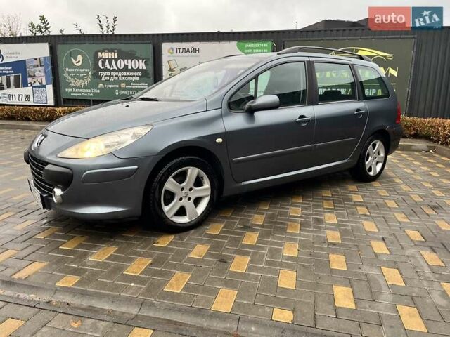Серый Пежо 307, объемом двигателя 1.36 л и пробегом 320 тыс. км за 4100 $, фото 2 на Automoto.ua