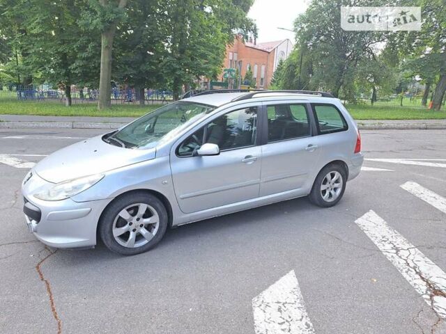 Серый Пежо 307, объемом двигателя 2 л и пробегом 320 тыс. км за 4400 $, фото 3 на Automoto.ua