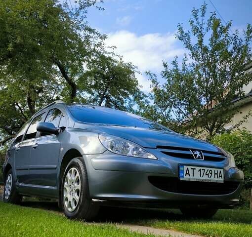 Сірий Пежо 307, об'ємом двигуна 1.59 л та пробігом 392 тис. км за 4100 $, фото 4 на Automoto.ua