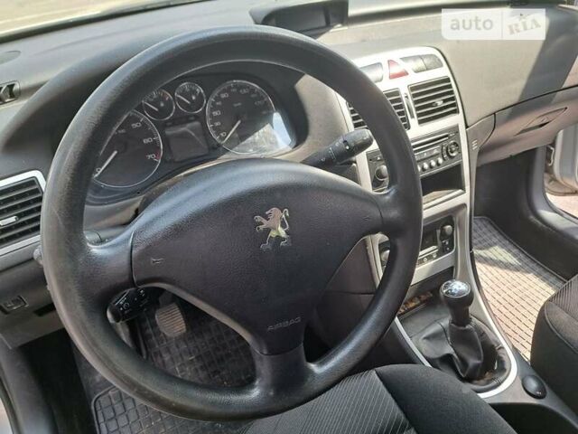 Серый Пежо 307, объемом двигателя 2 л и пробегом 320 тыс. км за 4400 $, фото 18 на Automoto.ua