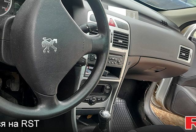 Серый Пежо 307, объемом двигателя 1.6 л и пробегом 205 тыс. км за 2100 $, фото 5 на Automoto.ua