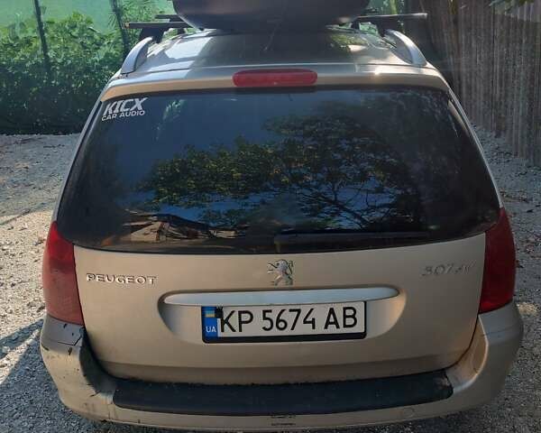 Серый Пежо 307, объемом двигателя 2 л и пробегом 287 тыс. км за 3500 $, фото 1 на Automoto.ua