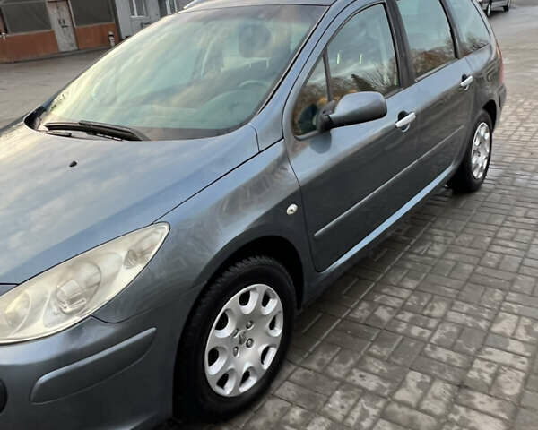 Серый Пежо 307, объемом двигателя 1.6 л и пробегом 242 тыс. км за 4800 $, фото 10 на Automoto.ua