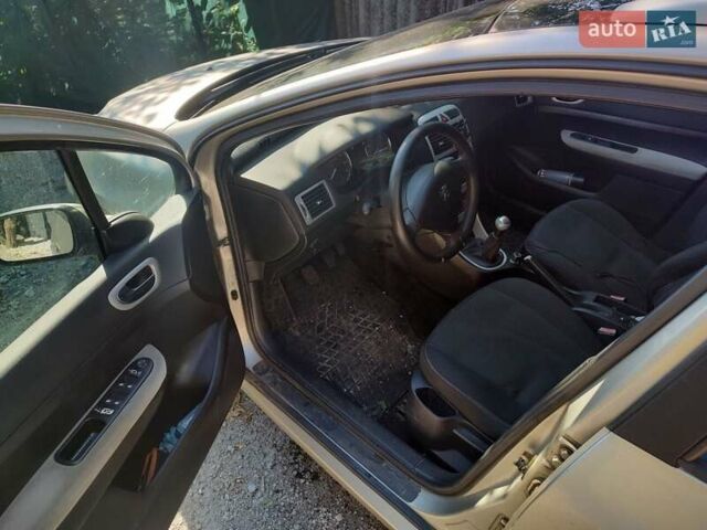 Серый Пежо 307, объемом двигателя 2 л и пробегом 287 тыс. км за 3500 $, фото 5 на Automoto.ua