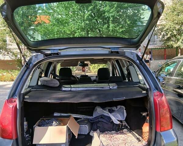 Сірий Пежо 307, об'ємом двигуна 2.01 л та пробігом 229 тис. км за 4900 $, фото 7 на Automoto.ua