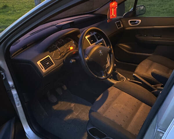 Сірий Пежо 307, об'ємом двигуна 2 л та пробігом 234 тис. км за 4800 $, фото 9 на Automoto.ua