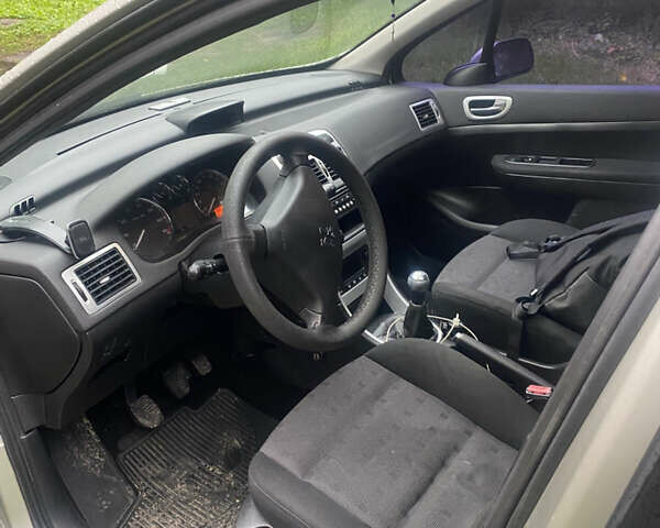 Серый Пежо 307, объемом двигателя 2 л и пробегом 280 тыс. км за 4300 $, фото 5 на Automoto.ua
