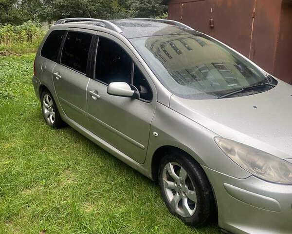 Серый Пежо 307, объемом двигателя 2 л и пробегом 280 тыс. км за 4300 $, фото 1 на Automoto.ua