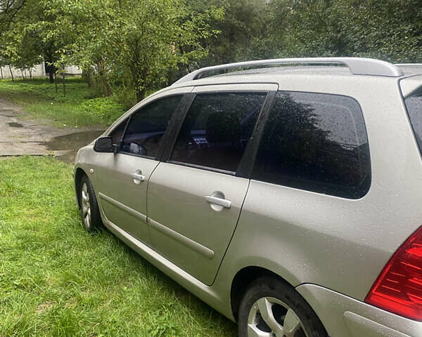 Серый Пежо 307, объемом двигателя 2 л и пробегом 280 тыс. км за 4300 $, фото 3 на Automoto.ua