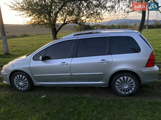 Сірий Пежо 307, об'ємом двигуна 2 л та пробігом 234 тис. км за 4800 $, фото 4 на Automoto.ua