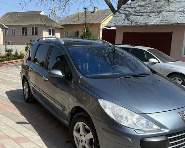 Сірий Пежо 307, об'ємом двигуна 2 л та пробігом 207 тис. км за 4400 $, фото 10 на Automoto.ua