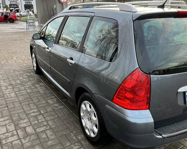 Серый Пежо 307, объемом двигателя 1.6 л и пробегом 242 тыс. км за 4800 $, фото 11 на Automoto.ua
