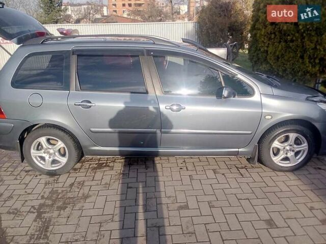 Сірий Пежо 307, об'ємом двигуна 1.59 л та пробігом 262 тис. км за 4000 $, фото 5 на Automoto.ua