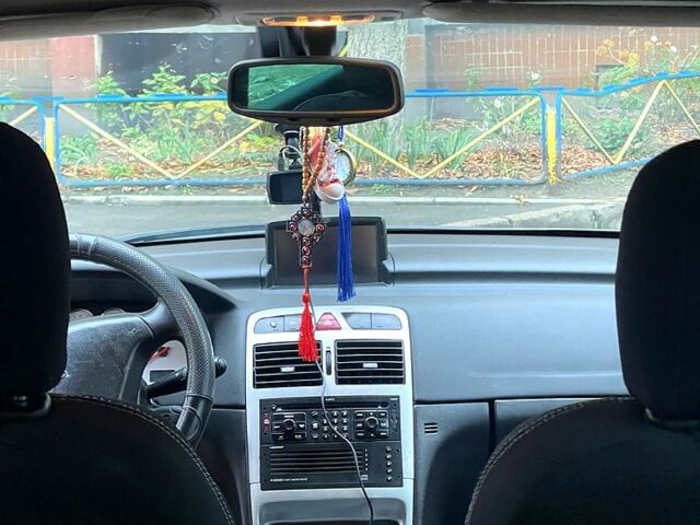 Серый Пежо 307, объемом двигателя 1.6 л и пробегом 370 тыс. км за 4500 $, фото 9 на Automoto.ua