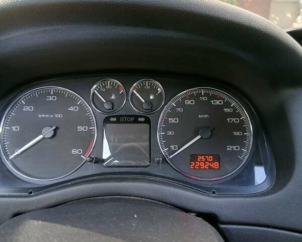 Сірий Пежо 307, об'ємом двигуна 2.01 л та пробігом 229 тис. км за 4900 $, фото 3 на Automoto.ua