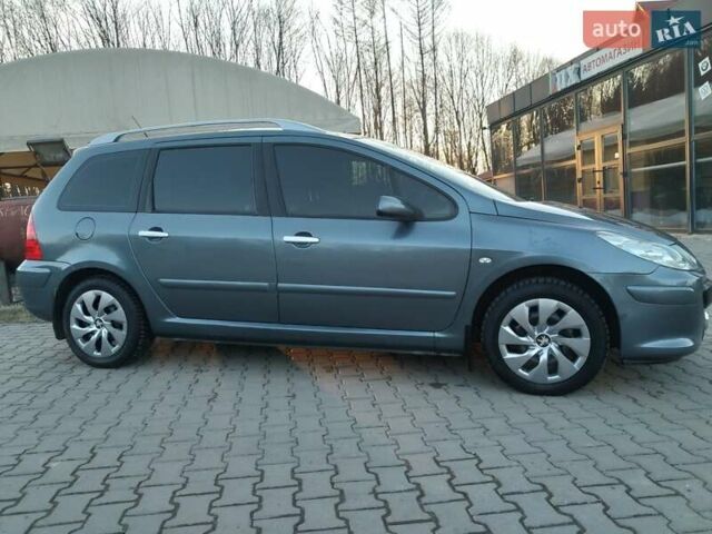Серый Пежо 307, объемом двигателя 2 л и пробегом 200 тыс. км за 3700 $, фото 8 на Automoto.ua