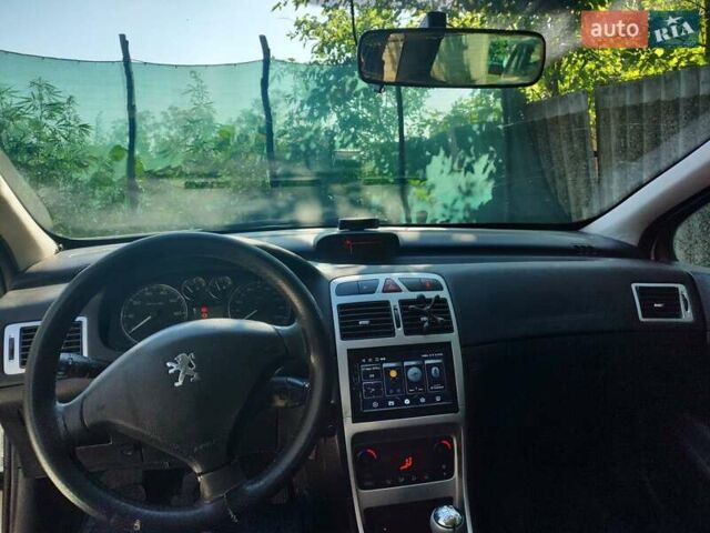 Серый Пежо 307, объемом двигателя 2 л и пробегом 287 тыс. км за 3500 $, фото 7 на Automoto.ua