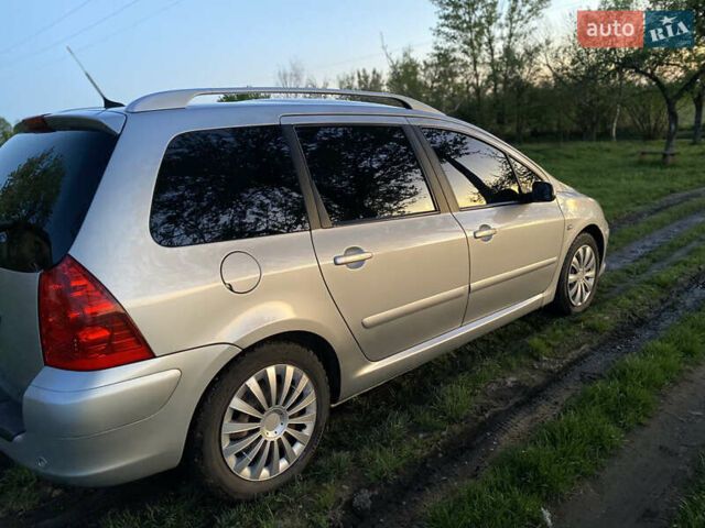 Сірий Пежо 307, об'ємом двигуна 2 л та пробігом 234 тис. км за 4800 $, фото 7 на Automoto.ua