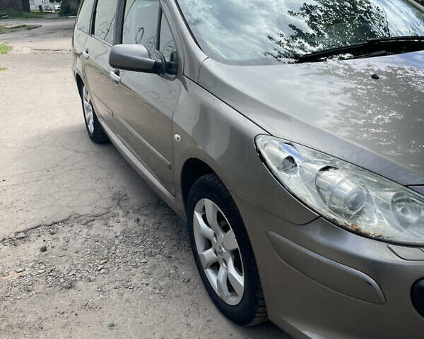 Сірий Пежо 307, об'ємом двигуна 2 л та пробігом 300 тис. км за 5200 $, фото 1 на Automoto.ua