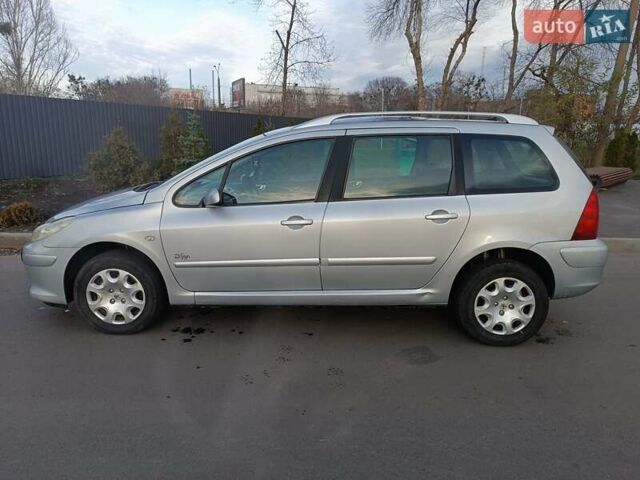 Сірий Пежо 307, об'ємом двигуна 1.59 л та пробігом 284 тис. км за 4300 $, фото 9 на Automoto.ua