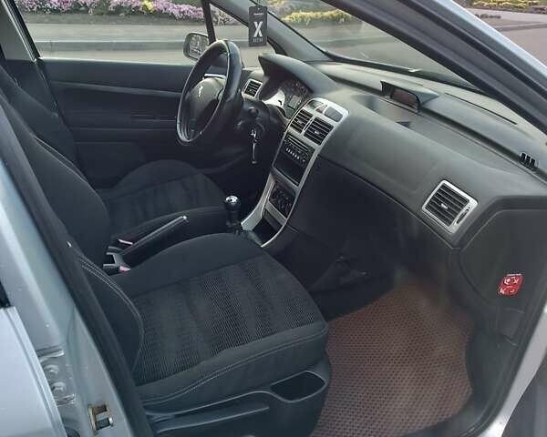 Сірий Пежо 307, об'ємом двигуна 1.59 л та пробігом 284 тис. км за 4300 $, фото 12 на Automoto.ua