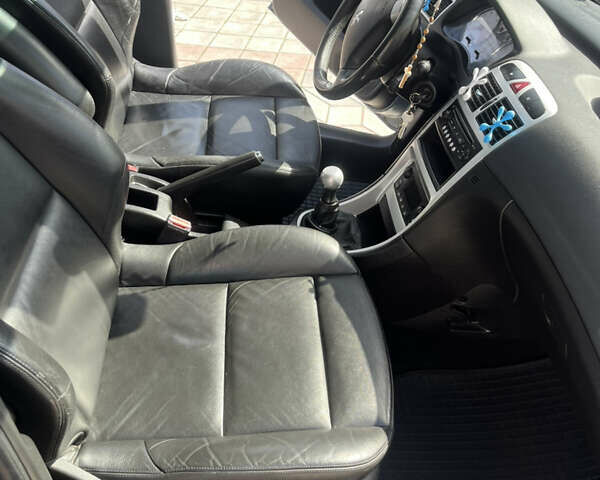 Сірий Пежо 307, об'ємом двигуна 2 л та пробігом 207 тис. км за 4400 $, фото 7 на Automoto.ua