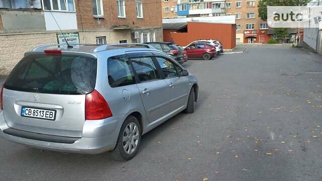 Сірий Пежо 307, об'ємом двигуна 1.59 л та пробігом 320 тис. км за 3999 $, фото 10 на Automoto.ua