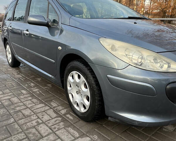 Серый Пежо 307, объемом двигателя 1.6 л и пробегом 242 тыс. км за 4800 $, фото 14 на Automoto.ua