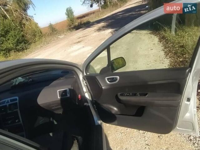 Серый Пежо 307, объемом двигателя 1.6 л и пробегом 253 тыс. км за 4250 $, фото 9 на Automoto.ua