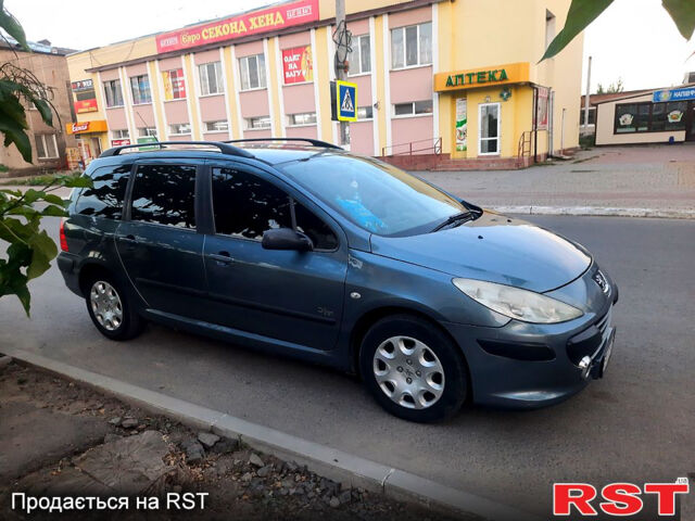 Серый Пежо 307, объемом двигателя 1.4 л и пробегом 270 тыс. км за 4000 $, фото 2 на Automoto.ua