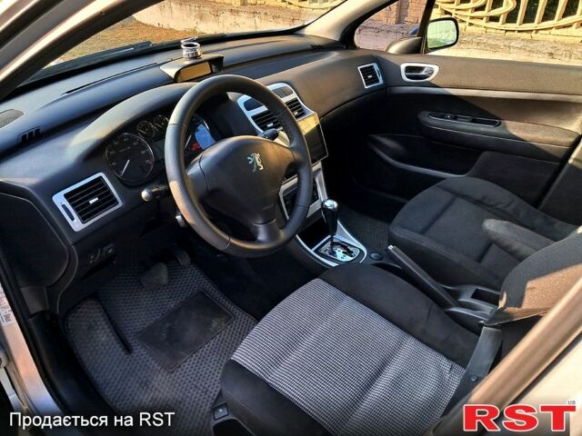 Серый Пежо 307, объемом двигателя 2 л и пробегом 387 тыс. км за 3500 $, фото 3 на Automoto.ua