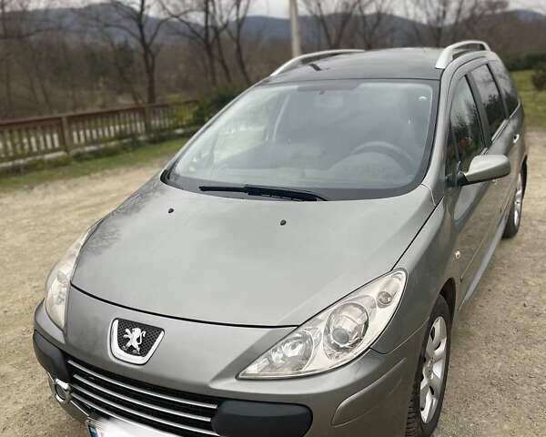 Серый Пежо 307, объемом двигателя 2 л и пробегом 171 тыс. км за 4400 $, фото 3 на Automoto.ua