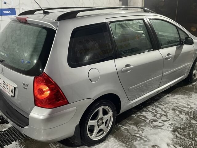 Серый Пежо 307, объемом двигателя 1.6 л и пробегом 306 тыс. км за 2849 $, фото 2 на Automoto.ua