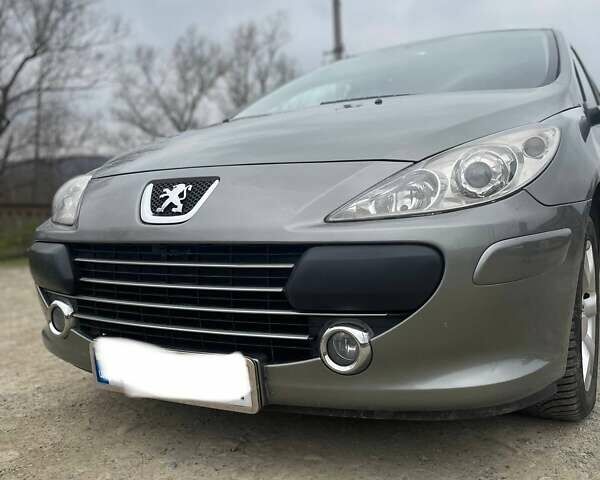 Серый Пежо 307, объемом двигателя 2 л и пробегом 171 тыс. км за 4400 $, фото 4 на Automoto.ua