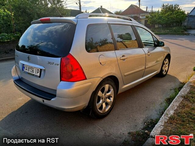 Серый Пежо 307, объемом двигателя 2 л и пробегом 387 тыс. км за 3500 $, фото 2 на Automoto.ua