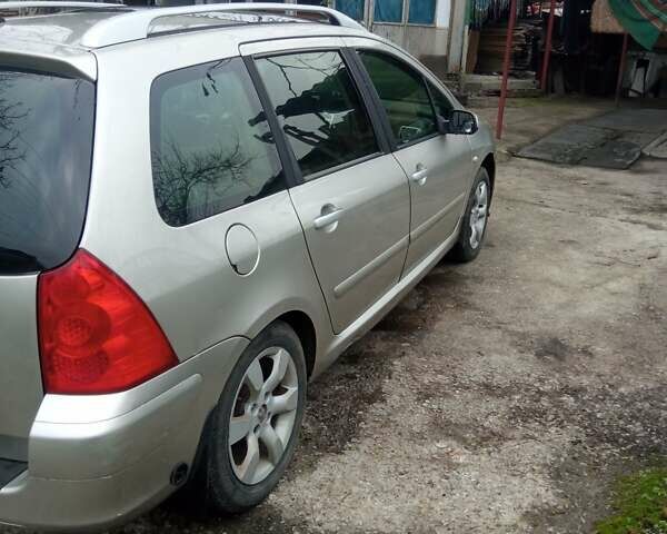 Серый Пежо 307, объемом двигателя 2 л и пробегом 302 тыс. км за 5100 $, фото 3 на Automoto.ua
