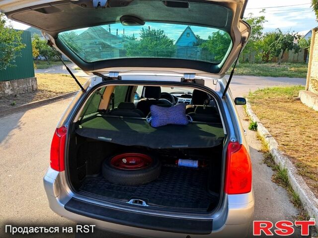 Серый Пежо 307, объемом двигателя 2 л и пробегом 387 тыс. км за 3500 $, фото 6 на Automoto.ua
