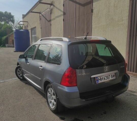 Серый Пежо 307, объемом двигателя 1.6 л и пробегом 290 тыс. км за 4600 $, фото 6 на Automoto.ua