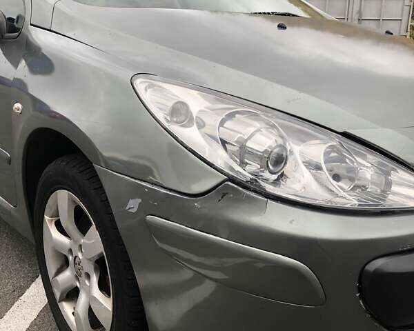 Серый Пежо 307, объемом двигателя 2 л и пробегом 216 тыс. км за 3200 $, фото 12 на Automoto.ua