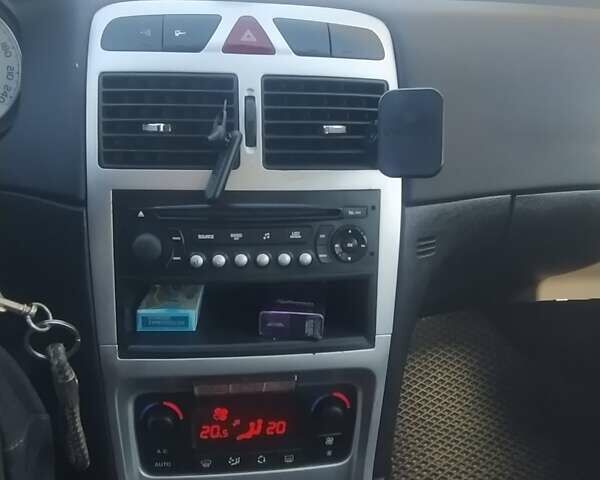 Серый Пежо 307, объемом двигателя 1.6 л и пробегом 253 тыс. км за 4250 $, фото 12 на Automoto.ua