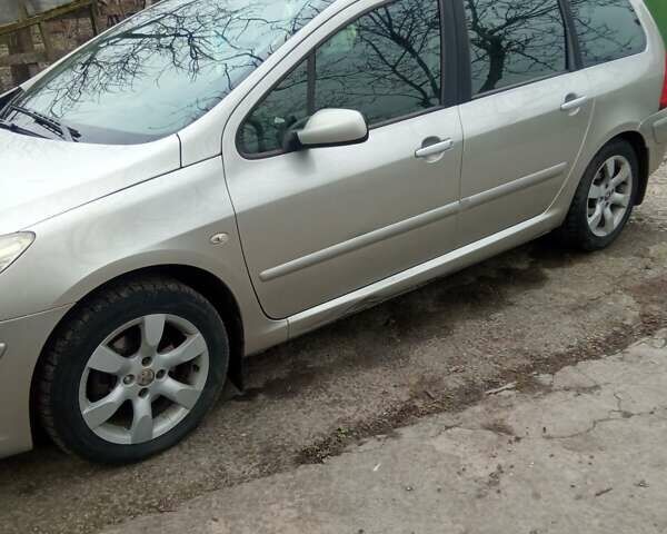 Серый Пежо 307, объемом двигателя 2 л и пробегом 302 тыс. км за 5100 $, фото 2 на Automoto.ua