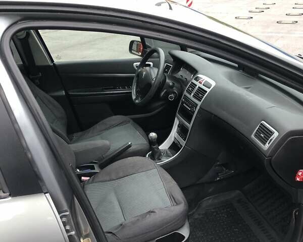 Серый Пежо 307, объемом двигателя 2 л и пробегом 216 тыс. км за 3200 $, фото 13 на Automoto.ua