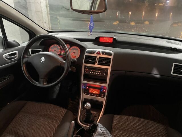 Серый Пежо 307, объемом двигателя 1.6 л и пробегом 306 тыс. км за 2849 $, фото 4 на Automoto.ua