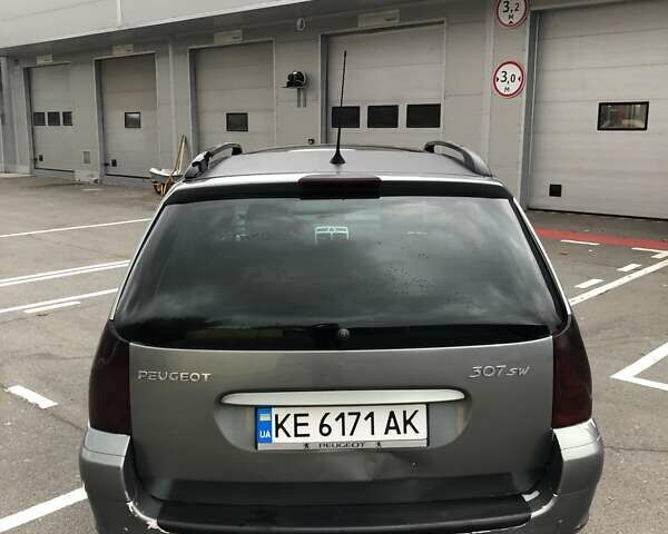 Серый Пежо 307, объемом двигателя 2 л и пробегом 216 тыс. км за 3200 $, фото 16 на Automoto.ua