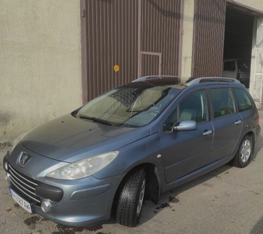 Серый Пежо 307, объемом двигателя 1.6 л и пробегом 290 тыс. км за 4600 $, фото 1 на Automoto.ua