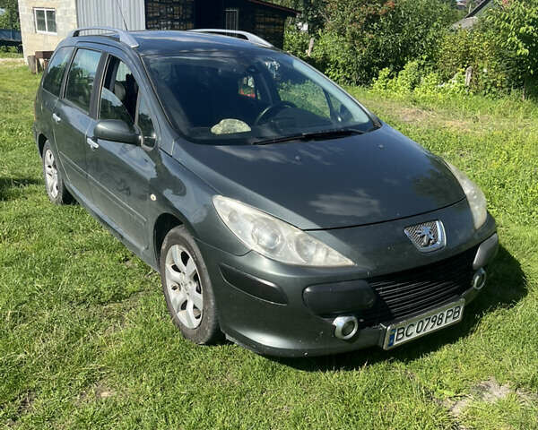 Серый Пежо 307, объемом двигателя 2 л и пробегом 283 тыс. км за 4100 $, фото 3 на Automoto.ua