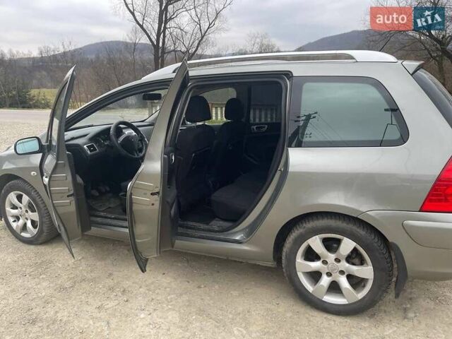 Серый Пежо 307, объемом двигателя 2 л и пробегом 171 тыс. км за 4400 $, фото 7 на Automoto.ua